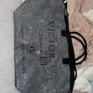 Sliver and black Victoria’s Secret duffel bag